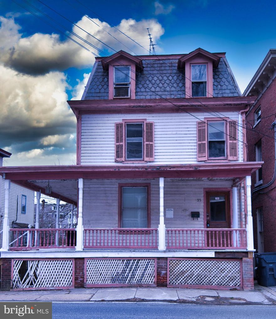 Come create a master piece with this historical Victorian home in downtown Port Deposit.  This property is zoned commercial/residential and has 2400 sq ft of living space. Restored, this house would be absolutely stunning with the large wrap around porch, original wood banister, tall ceilings, and large rooms. Property is being sold as is.