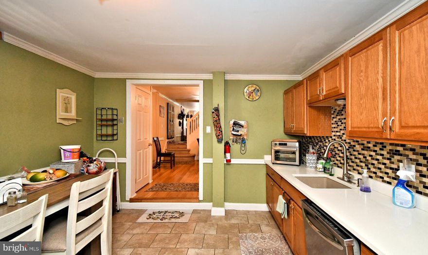 WOW! A Must See ! $25,000 PRICE DROP,! New Roof (2024) & New Heating System (2025) . NOTE: Sq. Ft. is larger then public records state as the finished attic is not included and also bump out of the kitchen and laundry Room.  Step into this beautifully maintained twin and if that's not enough  across the street a community playground currently being revitalized with new soccer fields, basketball courts, tennis courts, and a fantastic play area. The living room and dining room features warm bamboo flooring, while the eat-in kitchen offers tile floors, a stylish tile backsplash, quarts countertops and stainless steel appliances perfect for cooking your favorite meals. Off the kitchen, you will find a spacious laundry/mudroom with washer and dryer included, plus a convenient half bath to complete the first level. Upstairs, the primary bedroom is paired with a versatile loft space that could easily serve as a third bedroom or home office. The second bedroom is located in the finished attic, offering comfort and privacy. Outside, enjoy crisp fall evenings in your backyard, and take advantage of the detached one-car garage ideal for car enthusiasts or extra storage. Located just minutes from major highways, Philadelphia Premium Outlets, and Pottstown Memorial Hospital and within walking distance to downtown Pottstown with fabulous restaurants and activities. This Home is in Mint Condition,  Schedule your showing today and make this home yours!