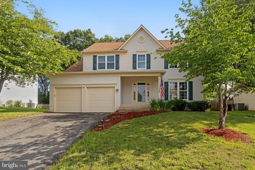 This home’s floor plan features a traditional separate formal living & dining rooms with a modern open kitchen and family room. The kitchen has been updated grey cabinets, neutral stone counters, stainless appliances and an oversized farmhouse sink. The fully fenced backyard includes a large deck that’s perfect for entertaining. Oversized primary bedroom with new tub and tile in the ensuite bath and a spacious walk-in closet. Three other bedrooms and a full bath round out the second floor. Down in the basement you'll find the 5th bedroom and 3rd full bath. The rec-room is pre-wired for surround sound, a wet bar with cabinetry and a beverage fridge. There's a water line hooked up for a full size refrigerator. Close proximity to MCB Quantico, i95, commuter lots. A short drive to Barley Naked Brewery, Grounds Bistro, Neighborhood Walmart and more!