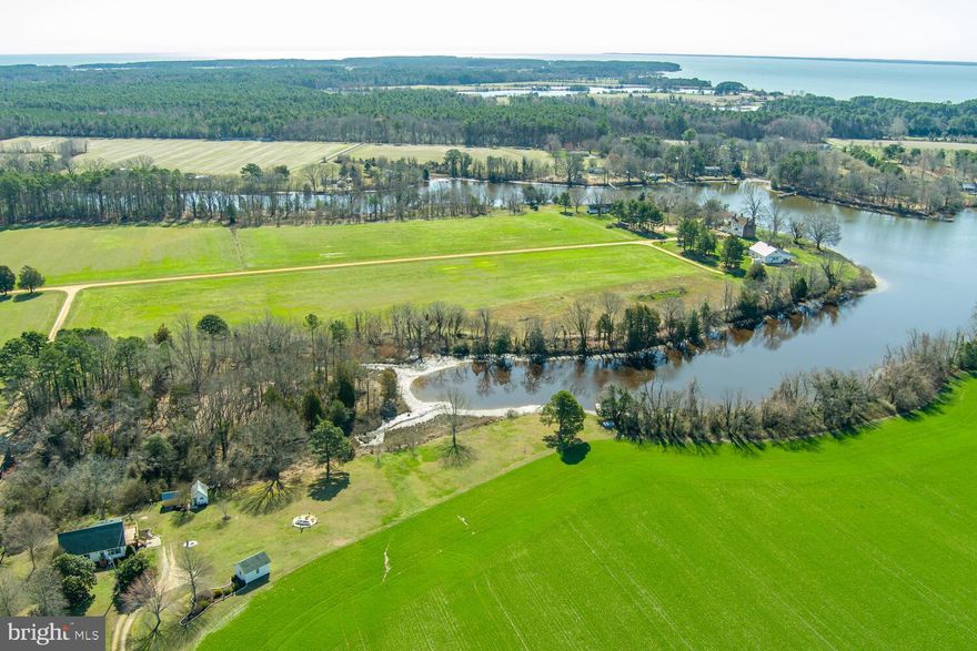 Welcome home to this charming Cape Cod nestled on the serene banks of Calvert Creek. Offering a tranquil retreat, it has four bedrooms, including a primary suite on the main level and 2.5 bathrooms. This home is a rare find.

Situated on a 2-acre lot enveloped by expansive protected farm fields, this property boasts privacy and natural beauty. Enjoy breathtaking sunsets from your very own deck or the newly added sunroom, with Calvert Creek flowing gracefully into the Potomac River.

The inviting sunroom is perfect for enjoying your morning coffee or watching the stunning waterfront views. Step outside to the pier and deck, perfect for relaxing evenings or entertaining guests. Additionally, three sheds, one with electricity, offer ample storage space for outdoor equipment and more.

Large eat-in kitchen with a pass-through window to the sunroom area. Wood flooring throughout the house. Still on the main level, you’ll find a spacious living room, the second bedroom/office the laundry room and a powder room. Upstairs, two large bedrooms and a full bathroom.   

Conveniently located near three famous restaurants in the county: Pier 450, Salt Waterfront Kitchen, and Courtney's Seafood. The house is also close to local marinas, like Point Lookout Marina, Drury’s and Buzz’s Marina, and Historic St. Mary's City. 

Easy commute to NAS Pax River, Webster Field Naval bases, and Washington DC. This home offers the ideal combination of tranquility and accessibility. Whether you're seeking a peaceful retreat or a place to create lasting memories with loved ones, this property is sure to exceed your expectations. Schedule your private showing today!