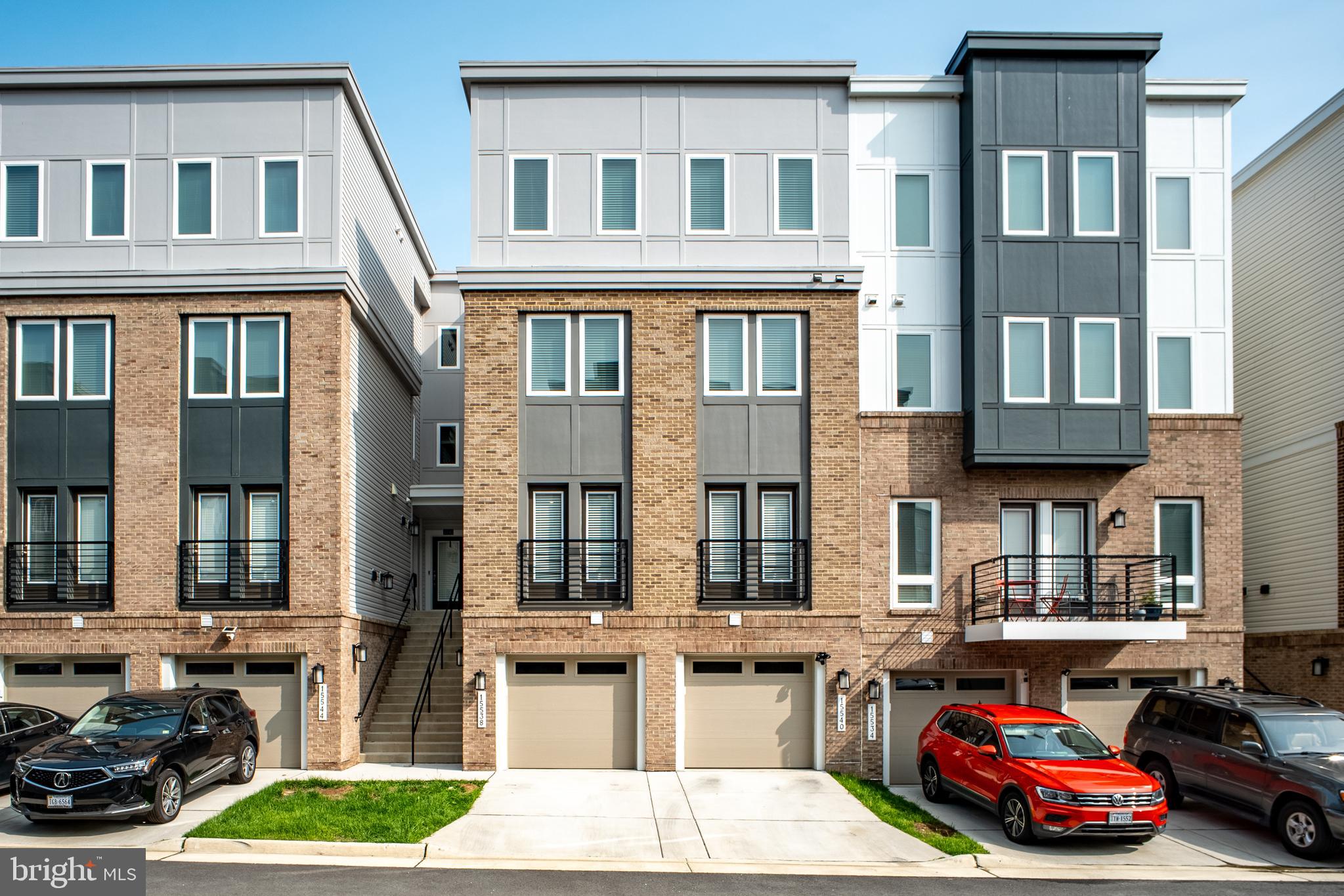 Welcome to the 2022-built stylish and spacious townhome style condo in the heart of Woodbridge’s sought-after Rippon Landing Condominiums! This 3-level Lennar Brighton model offers a fresh, modern feel with 3 spacious bedrooms, 2 full baths, and a convenient half bath.
Step inside and enjoy the sleek, open-concept design. The main level features stylish vinyl plank flooring and large windows that fill the space with natural light. The gourmet kitchen is a showstopper with granite countertops, stainless steel energy-efficient appliances, and a massive island—perfect for prepping meals or enjoying coffee with friends. Whether you’re cooking, relaxing, or entertaining, the open layout connects the kitchen, dining, and living areas in an easy, comfortable flow.
Upstairs, you’ll find three generously sized bedrooms with oversized walk-in closets and updated bathrooms that make daily routines feel like a luxury. The primary suite offers the kind of space you don’t often find in condo living, with room to stretch out and recharge. Every level of this home has been designed with comfort and style in mind, from the smart Ring video doorbell and EERO Wi-Fi system to the energy-saving features that help keep your home running efficiently year-round.
Parking? No problem! You’ve got your own garage, a private driveway, and plenty of guest spots nearby. Even better, your condo and HOA fee covers water, sewer, trash and recycling pickup, landscaping, and exterior insurance—so you can spend more time enjoying your home and less time worrying about upkeep.
Location is everything—and this one checks every box. You’re just steps from the Virginia Railway Express (VRE), with super easy access to I-95, Route 1, and all the best shopping, dining, and recreation in the area. Costco, IKEA, Stonebridge at Potomac Town Center, and the charming waterfront of Occoquan are just minutes away. You’re also close to parks, trails, and natural escapes like Featherstone National Wildlife Refuge, Neabsco Regional Park, and the Potomac River.
This is your chance to own a stylish, low-maintenance, move-in ready home in a location that keeps you connected to everything. Schedule your showing today and come see what makes this one stand out!
