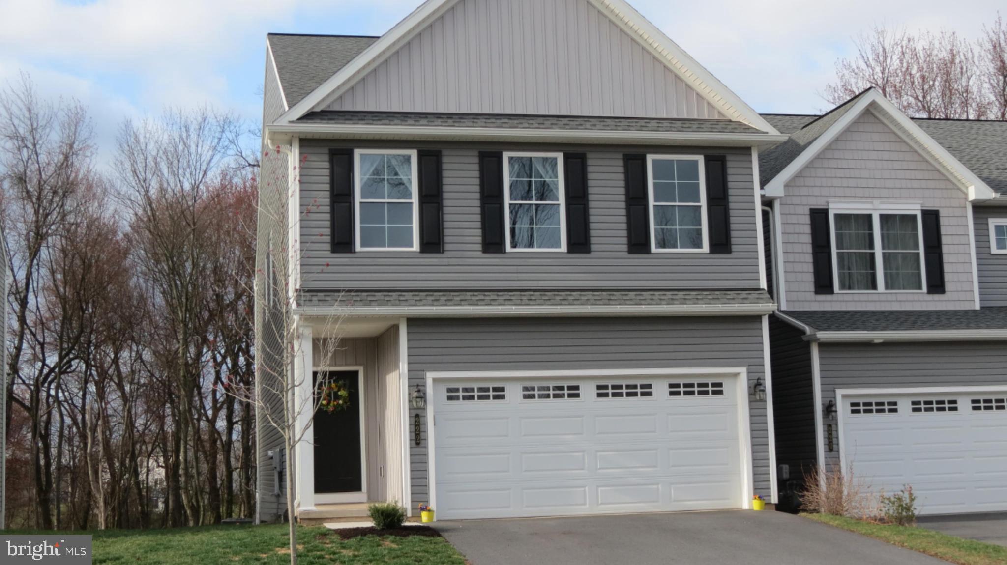 Beautiful 2-year old end unit close to Hershey/Harrisburg/Lancaster. This almost new 2023 three Bedroom 2.5 Bath Pheasant townhome with an open/flowing design provides a multitude of upgrades not included in the base price of a new Pheasant floor plan which starts at $374,390. A partial list of the $21,000 in upgrades include a walk-out Day Light basement, oversized 21 x 12 deck with railing, granite kitchen counter tops, upgraded plumbing fixture, additional LVP (Luxury Vinyl Plank flooring), full bath rough-in in the lower level and rounded drywall corners (The full list of upgrades available online). The Woodland Hills development sits high above the surrounding farm fields and the town of Middletown, providing a quiet and peaceful setting, spectacular scenery with endless sunrise and sunset views. 222 Sage Blvd also brings an above average location within Woodland Hills as this rare lot, unlike others, enjoys a private wooded backdrop commonly hosting Whitetail Deer, fox and other woodland visitors. You'll find the kitchen includes an upgraded cabinet design and large walk-in Pantry. Forget scraping frost from the windshields, the 2-car garage keeps your vehicles warm and dry. We can provide a quick settlement if your timeline requires.