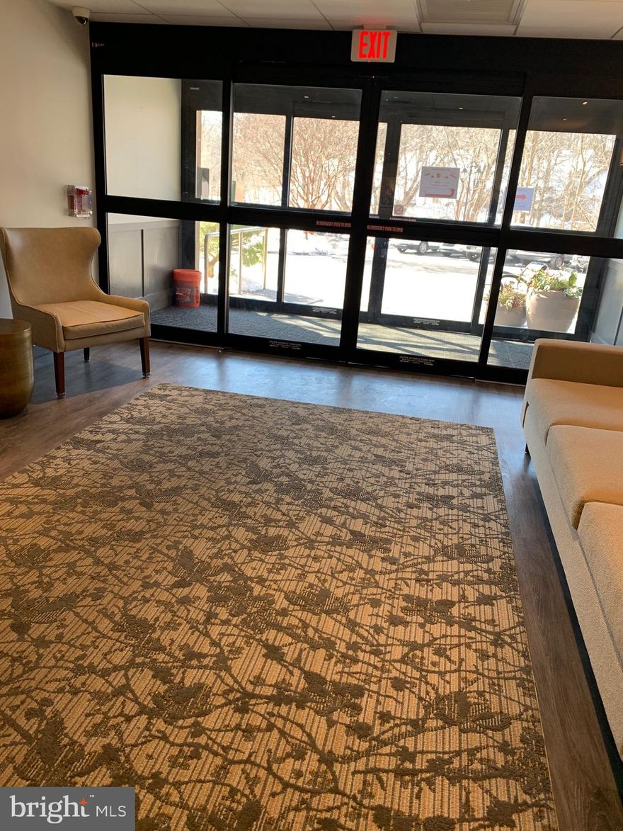 A very cozy condominium with a wonderful view of the woods and Crum Creek. Freshly painted and new carpeting in living room, dining room, hallways and bedrooms. The combination of the living room and dining room give the feeling of an open floor plan,  enough room for an office if needed. The sliding door to the balcony gives easy access to the open outdoors.  Large closet in living room  for coats and  a hall closet for your towels, linens etc.  The laundry room is right off the hallway beside the living room for your convenience.  The kitchen is a nice size eat in kitchen with the refrigerator included in the sale of the condo.  The first bedroom is right across from the full size bathroom.  The second bedroom has its own  full size bathroom along with ample closets .  The storage unit for this condo is noted in the pictures .  A fine place to store anything extra. It is located across the hallway from the condo.  This is included in the sale of the condo.  One of the many amenities that is offered is the pool which is in operation in the summer months.  There will be a $5,000.00 credit towards settlement with an acceptable agreement of sale.