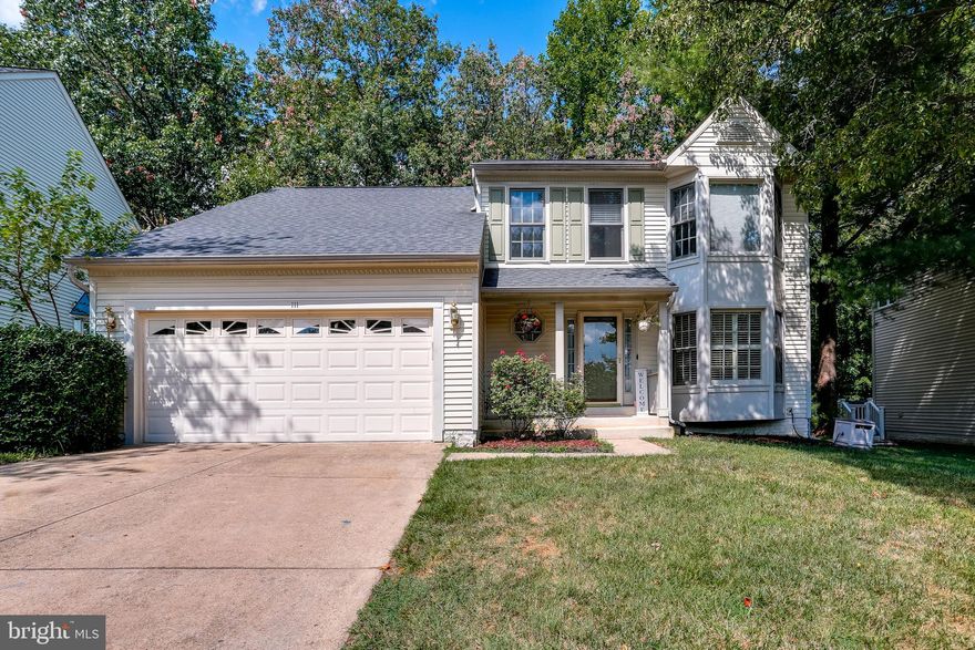 PRICE REDUCTION! Seller's made new improvements and are motivated! Welcome home to this rare find floor plan with 3 bedrooms, 2.5 bathrooms and a LOFT! This home is a jewel nestled on a quiet cul-de-sac in the highly sought after Russett Community. The bright two story foyer greets you with a flexible open living space. Off to the right is a formal living room that leads to the formal dining room. Gleaming hardwood floors are throughout the main level. With multiple bay windows, crown molding, and plantation shutters. Kitchen has been updated with granite and stainless steel appliances. The kitchen provides space to eat in and flows perfectly into the two story sunken family room with vaulted ceiling and an updated gas fireplace accented with white marble. French doors off the family room lead to a new large deck and lower patio area with a cozy wooded back yard. The skylights provide ample light to the loft space that overlooks the family room and kitchen. This unique sizable loft space is super flexible and can be easily converted into a 4th bedroom. Spacious primary bedroom with an en-suite, vaulted ceilings, and walk-in closet. Bathrooms  recently updated with new marble countertop vanities and new bathroom fixtures.  Additional bedrooms are of good size. Large unfinished basement ready to make your own. Roof, gutters, and siding are less than 10 years old. Newer hot water heater and garage door opener. Washer and dryer on main level with additional units in the basement. You won’t be disappointed in this well maintained home. Enjoy all the amenities offered from Russett including basketball courts, soccer fields, tennis courts, clubhouse, parks, and 4 community pools that include laps lanes and kiddie pools. Close to major commuting routes and convenient to restaurants and shops. Schedule a showing today! All guest are required to wear mask, please limit touching surfaces. If anyone is showing symptoms or signs of COVID please do not show.