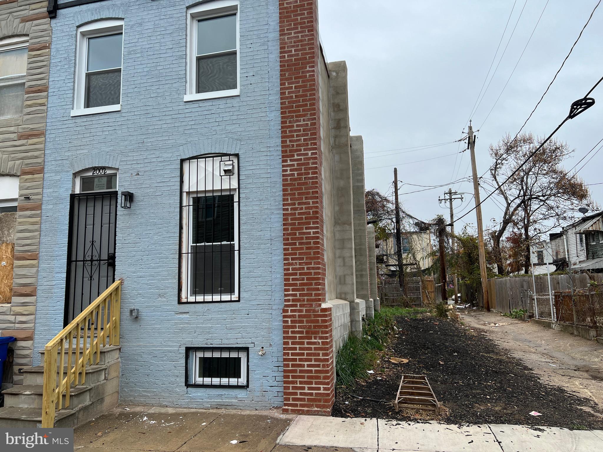 FTHB/Investment Opportunity. Beautifully renovated in 2023 with permits, 3-story, 2 BR/1.5 Bath end of group townhome. All new kitchen appliances, built-in microwave oven, soft close cabinets, recessed lights, water heater, heat pump and laminate flooring. Finished basement. Metal doors at front and back for security. As you enter front door, you are in the living room with eat-in kitchen and half bath at main level. Upper level has two carpeted bed rooms and one full bath. Basement has two separate dens/study rooms and spacious Family room , recessed lights. Back yard is fenced-in with a gate. Plenty of street parking. Close to Downtown amenities, Union Square, Inner Harbor and minutes to I-95. This is a MUST SEE HOME.
