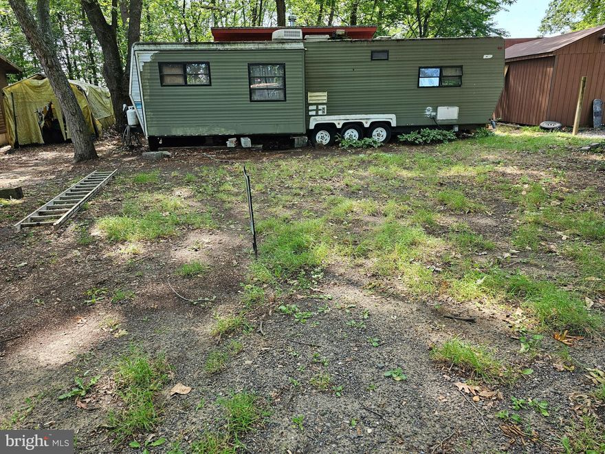 Date of trailer is estimated for now. Oversized lot is a great vacation and weekend retreat in a gated community. Indian Acres Campground is restricted to 150 days a year no more than 100 consecutive days (not a full time residence). Minutes to the Chesapeake Bay by boat via Sassafras River. Lots of community activities, swimming pool, tennis courts, basketball courts, playground, community building, beach area, boat ramp, fishing ponds, arcade, store. HOA fee and Membership application prior to purchase.