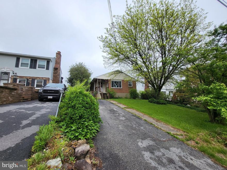 This is a Fannie Mae Reverse Mortgage Foreclosure.  Here is the chance for two homes in one.  The main level with covered front porch has a living room, eat-in kitchen, three bedrooms, full bath and attic access.  The lower level, connect by interior stairs, has a side entrance as well.  The lower level has the utility room, a galley kitchen, living room, full bath and two bedrooms.  The rear yard is flat and quiet with two sheds.