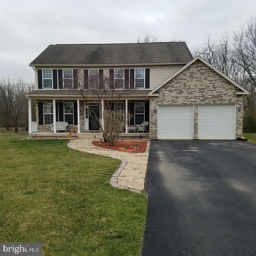 Wanna' see a Great Home. Here it is.  This home offers everything you'd want for day to day living, from Activities for the family to Entertaining Guests. It has plenty of space, Indoors and Out, along with a lot of privacy, amenities, and a quiet, safe, neighborhood for the kids. This home is located at the end of a culdesac and has good access to Rt. 51 East to Charles Town and West to Inwood and the Rt. 81 Highway, North and South.  Access to Northern Virginia is easy through the back roads of Summit Point to Rt. 7 East, Berryville, Va.. As you pull into the driveway, there's an attached 2 car garage for the rainy and snowy days and a beautiful flagstone walkway that leads to an inviting front porch and entry into the home. When you walk through the front door, there's an oversized Foyer with a nice office to the right. Continue straight up the stairs to the bedrooms, or bear right down a short hall to the Kitchen / Dining, Living Room area. The rooms have floor to ceiling windows for extra light and the Living Room has a nice Gas Fireplace for those cool snowy days of sitting by the fire, reading a book and having a Hot Chocolate or Coffee. The Kitchen / Dining Room area has a nice Island and plenty of counter / cabinet space with updated appliances.   You can access the back deck from the Kitchen / Dining Room area and through a pair of French Doors. There you will find a Hot Tub, built into the deck with low voltage lighting on handrails and steps, with planters, a built in bench, and more. Access to the back yard is fantastic. In fact, with a  wooded area and lots of open space there's an opportunity to build a patio, firepit, volleyball court,  add a workshop, additional garage, barn, or other areas to suit your taste, with nothing but, FARMLAND behind your property. Now. The Basement. Wow. Here you'll find The Theatre Room, Game Room, Bar, and Workshop, all Finished with nice Hardwood Floors, French doors, Full Bathroom and other aspects of  a great Home, YET, you'll feel like you're out on the town. The Master Bedroom is spacious, has a Great Master Bath, and Walk In Closet. It feels more like a mini- suite. All other bedrooms are spacious and comfortable which brings everything together making this HOME A "Must See." Again..Welcome Home !