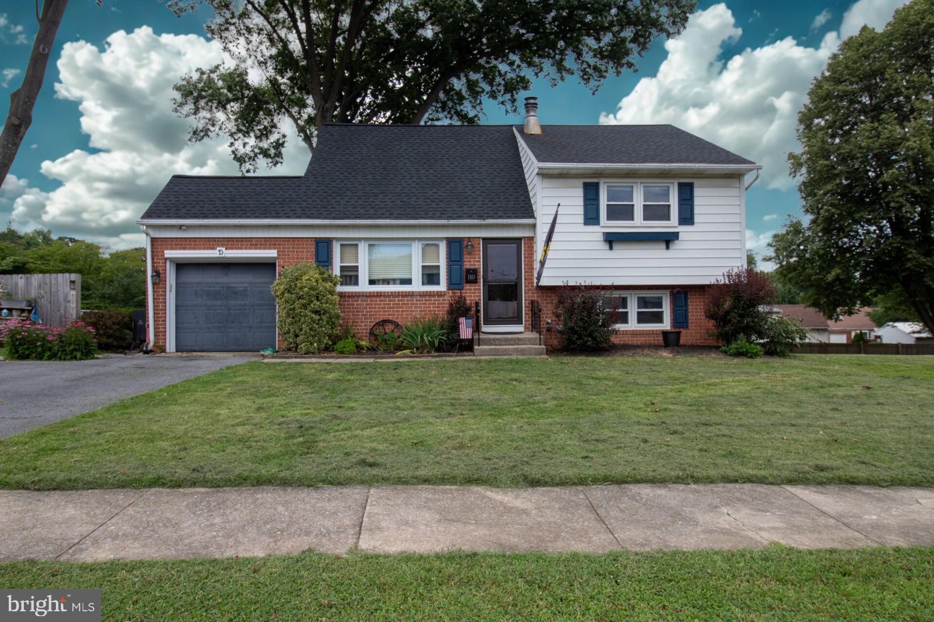 This beautiful split-level home in the highly sought-after West Lawn area offers more than just a place to live -- it's a true lifestyle retreat! Whether you're relaxing on the expansive screened porch, grilling on the brick patio, tending to your raised garden boxes, or gathering around the outdoor fire pit, you'll love the seamless connection to the outdoors. The lower-level walkout also features a fantastic workshop space for hobbies or storage as well as a conveniently located half bath and laundry area.
Inside, enjoy solid hardwood floors throughout the living room, dining room, and secondary bedrooms. The warm and inviting family room features a striking stacked stone wall with a wood-burning stove - perfect for cozy evenings. The kitchen is a chef's dream, boasting custom Hefflinger cherry cabinets and a large island that flows into the dining area, ideal for entertaining.
The spacious primary bedroom includes an ensuite bathroom and double closets, with one walk-in closet offering access to a large attic space - perfect for storage or easily converted into additional closet space. Two more good-sized bedrooms and a full hall bathroom complete this home.
Don't miss the opportunity to own this stunning home where comfort, charm, and lifestyle come together!