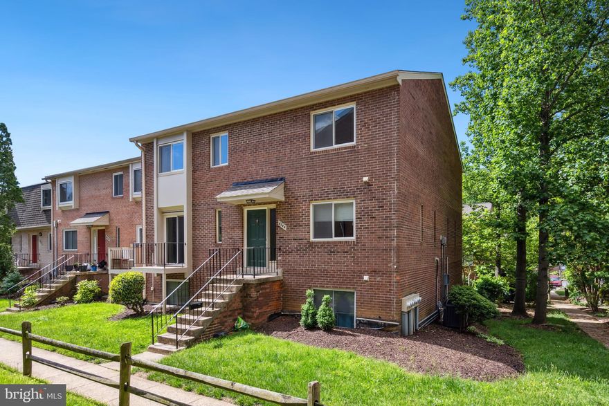 Completely Remodeled All Brick End Unit Condo Townhome offering 3 spacious bedrooms & 2 full baths & centrally located close to lots of grocery, dining, parks & outdoor recreation & minutes to the beltway! 
Covered entrway opens to an open & airy floor plan that features a renovated kitchen with white & grey Quartz countertops, top of the line white shaker cabinetry, stainless steel appliances & light grey luxury vinyl plank flooring throughout the main level. Lovely dining room with modern chandelier, laundry area with full size front loading washer & dryer. Expansive family room with lots of recessed lighting & a balcony with lovely garden views & a huge walk-in closet in the foyer area completes the main level! Make your way upstairs to the bedroom level where you will a generous sized primary bedroom suite with a big closet & a private upgraded bathroom with white tile, tub/shower combo, ceramic tile flooring,  modern mirrors & lighting & Quartz counterop on a comfort heigh vanity.   BIg storage closets line the hallway as well! 2 Spacious additional bedrooms have ample closet space, plush carpeting, big windows that let in lots of natural lighting & also share an upgraded bathroom with comfort height vanity with Quartz countertop, modern mirror & fixtures & tub/shower combo with glass doors. All the windows & sliding glass door have been replaced too. Wonderful neighborhood amenities, an outdoor pool, playground, lush, green common grounds. 1 assigned parking space with lots of open spaces. Additional storage in the attic! Great for investors!
