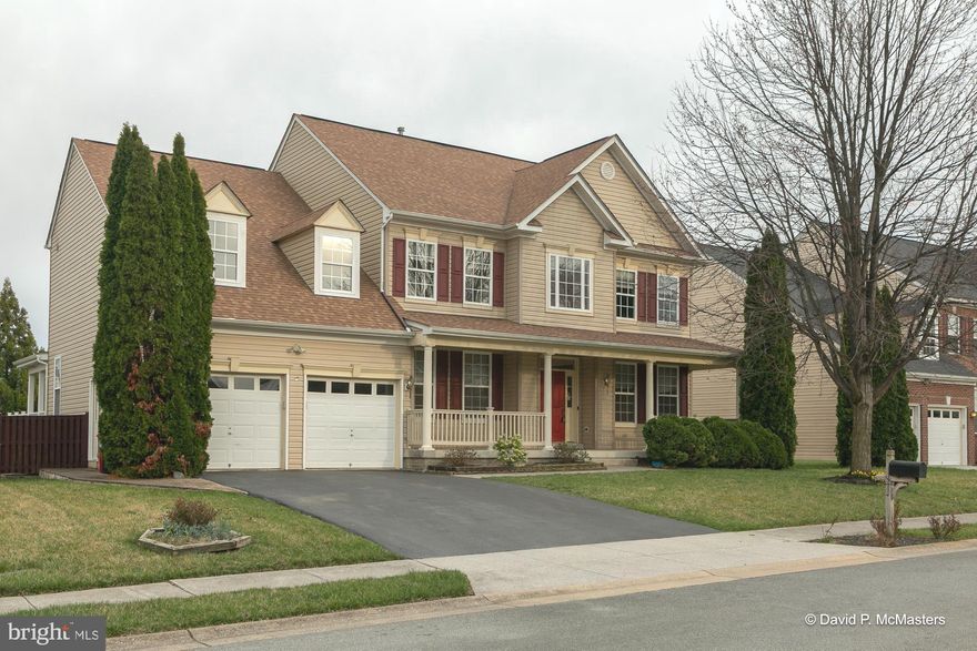 This beautiful colonial style house is a must see! This property is located in the sought after neighborhood of Norborne Glebe, which has many amenities including the community pool. Featuring fireplace, huge gourmet kitchen, stainless steel appliances, double wall ovens. The basement features a full functioning bar with a fridge, plus two other large rooms and a family room area with a full bathroom. The main level has gorgeous original hardwood floors, a sunroom, and a large study.  Upstairs has 4 large bedrooms and 3 full bathrooms, very unique layout on this home. Exterior of home offers a large deck to relax on , a stone patio and a fenced in yard for your privacy! This is the perfect house for your family to call home. Roof and siding were  installed in 2020 and two new garage doors are installed as well. Seller offering $15,000 in closing cost assistance or take it off listing price!