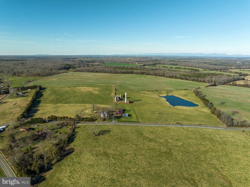 Welcome to Spring Knoll Farm! Located just a couple of miles southeast of Midland lies this immaculate income producing farm with an extensive amount of road frontage along Midland Road as well as Ritchie Road. Composed of approximately 84 stunning acres of tillable land and 30 acres of pasture ground for your cattle or livestock. The cell phone tower on the property is disguised as a silo and brings in more than $1,500 a month for the next 50 plus years! This cell tower has the capabilities of taking on more providers so the income could go up significantly in the future. Currently being leased for crop and hay production bringing in $4,450 each year. This parcel will continue to stay in its original state as it is protected from development by the Virginia Outdoor Foundation’s conservation easement program. Under the conservation easement, this parcel is eligible for a new home to be built up to 2000 square feet and the existing home can be remodeled or replaced with no square footage limitations. The existing home has over 2,200 sq ft of living space with 6 bedrooms and 2 full bathrooms. There are numerous outbuildings including 2 barns, 2 equipment sheds, a carport, and a run-in shed to shelter your equipment or belongings. Located towards the northern side of the farm is a large pond that supplies water for livestock and attracts many species of waterfowl. This parcel has a very subtle change in topography with only about 30 ft of elevation change across the entire farm. Contact us today for more details or to schedule a private showing of this elite farm! DISCLOSURE: Property to convey “AS-IS”. All inspections will be for informational purposes only. Do not drive in the crop or pasture fields and do not block the road leading to the cell tower silo. Farmer growing crops reserves the right to harvest his crops this coming fall and/or winter. Shown by appointment only and must be accompanied by a licensed agent.
