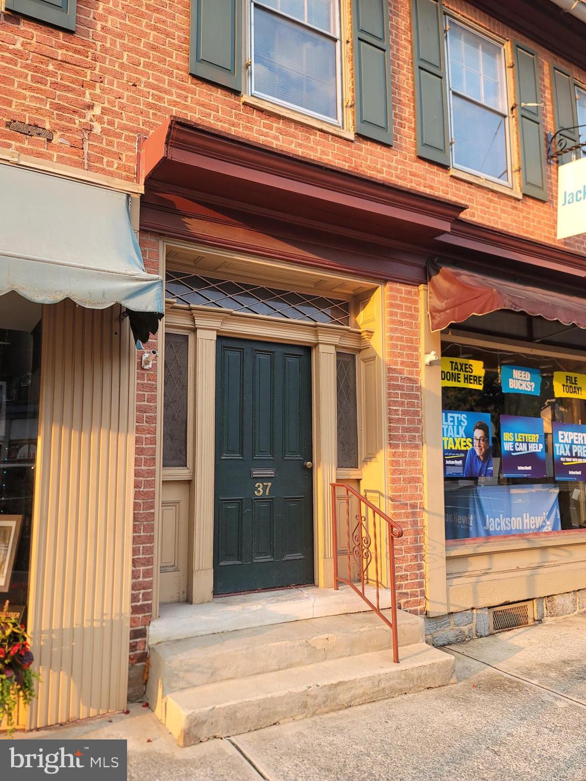 Now available - second floor one bedroom one bath rental offers spacious living room, den, dining room and kitchen! Covered rear porch, off street parking for one vehicle.
