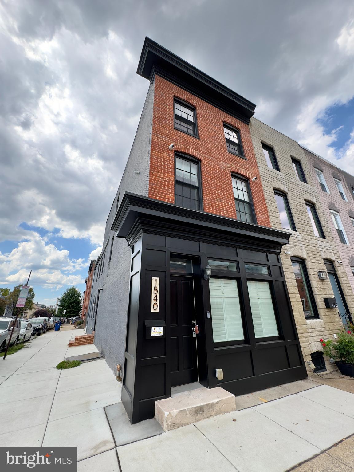 Located at 1540 S Charles St in the vibrant heart of Baltimore's sought-after South Baltimore community, this exceptional end-row townhome offers refined city living with contemporary comfort. Designed with elegance in mind, the home features rich wood flooring throughout, an airy interior with wide windows that flood the space with natural light, and timeless neutral color tones that suit any style.
Step into a light-filled main living area where a ceiling fan and accented ceiling detail complement the spacious layout. The nearby half bath is smartly placed for convenience. The dining area stands out with its exposed brick accent wall, pendant lighting, and a seamless connection to the side of the block through large windows. A modern kitchen anchors the main floor, showcasing stainless steel appliances, extensive built-in cabinetry, a window sink, and a direct exit to the fenced backyard, perfect for outdoor relaxation or pet enjoyment.
Upstairs, a secondary kitchenette offers added flexibility with a sink, cabinet space, and access to a private balcony with views of the surrounding neighborhood.
The primary and second bedrooms each offer private en suite bathrooms, rich wood flooring, ceiling fans, and wide windows that allow ample natural light. The primary suite also features a spacious walk-in closet with built-in drawers, cabinets, and shoe shelving. The accompanying bathroom is outfitted with a soaking tub, dual vanities, tiled bath and flooring, custom mirrors, and plentiful lighting. The second en suite bath includes a walk-in shower enclosed in glass, tiled walls, and a wide vanity with storage.
The third bedroom also enjoys generous space, wood flooring, a ceiling fan, and a large closet, with easy access to a nearby full bathroom featuring modern tile finishes, walk-in glass shower, and ample storage.
Additional highlights include a dedicated laundry nook with washer and dryer, and a paved and fenced backyard ideal for pets or entertaining.
Residents enjoy 24-hour emergency maintenance and the convenience of an online tenant portal for all account needs. The home is conveniently located near essential amenities, public transportation, and some of the city's most popular destinations.
Local Attractions and Commute Times:
M&T Bank Stadium – 5 minutes
Inner Harbor – 7 minutes
Federal Hill Park – 4 minutes
American Visionary Art Museum – 6 minutes
Cross Street Market – 3 minutes
Access to I-95 – approximately 6 minutes
Access to I-395 – approximately 5 minutes
Dogs and cats up to 45 lbs are welcome with a signed pet addendum and a $500 non-refundable pet fee.
Agency disclosed upon initial contact. Agent conducts showings; BMG manages follow-up, paperwork, move-in post-approval. Vouchers work with BMG directly.