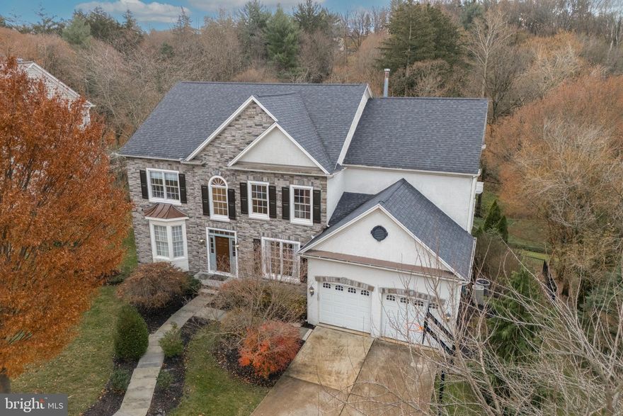 Welcome to 2138 Basswood Dr, an exquisite 4 bedroom, 4.5 bath residence in The Reserve at Lafayette Hill that offers luxurious living in a beautiful setting. As you step inside, you are greeted by a grand foyer entrance with a curved staircase, decorative columns, and hardwood floors that sets the tone for the elegance and sophistication that awaits. The foyer opens to a formal living room with two bay windows and a formal dining room with custom woodwork and crown moulding. Just off the foyer, a set of French doors leads to a private home office.

The heart of the home is the family room, which boasts towering ceilings, expansive windows that flood the space with natural light, and a stunning marble fireplace, creating a warm and inviting atmosphere for gatherings. The family room opens to an eat-in chef's kitchen with granite counters, high-end stainless appliances, center island, butler's pantry, and a breakfast room sliders that open to the rear deck with picturesque wooded views. A powder room, laundry room, and mudroom with access to the garage complete the first level.

Upstairs, the primary suite features a walk-in closet and en suite bath with separate vanities, jacuzzi tub, and separate shower. A second bedroom with ensuite bath and two additional bedrooms sharing a jack-and-jill bath complete this level.

The finished walkout basement is a true gem, offering plenty of extra living and storage space, a gym, a full bathroom, and access to the covered patio, providing additional space for relaxation and entertainment. Outside, the South-facing backyard allows for maximum sunlight and features an outdoor kitchen, in-ground pool, and a hot tub, creating a resort-like oasis for outdoor enjoyment.

Situated in a beautiful setting backing up to woods, this home offers a serene and private retreat while being conveniently located near all the amenities and attractions that Lafayette Hill has to offer, including several parks, grocery stores (Giant and Whole Foods), and much more. Less than 30 minutes to downtown Philadelphia, 20 minutes to King of Prussia, and 10 minutes to Conshohocken. Don't miss the opportunity to make this exceptional property your new home and experience the epitome of luxury living.