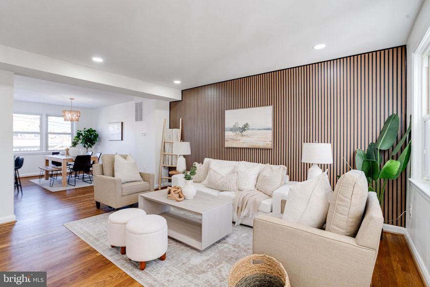 Stunning Fully Renovated 3-Level Home in Baltimore!
This beautifully updated 4-bedroom, 2-bath residence offers exceptional finishes, thoughtful design, and brand-new mechanical systems for total peace of mind. Step inside to an open and bright main level featuring new flooring, recessed lighting, and a stylish accent wall that instantly elevates the living space.

The gourmet kitchen is a true showstopper, featuring gorgeous quartz countertops, a dramatic double waterfall island, a custom backsplash, stainless steel appliances, and modern cabinetry—perfect for both everyday living and entertaining.

Upstairs, you’ll find generously sized bedrooms filled with natural light and a beautifully updated full bathroom. The fully finished lower level expands your living possibilities with a second living area and a stylish entertainment space featuring a custom wet bar, built-in cabinetry, designer backsplash, and wine/beverage refrigerator—ideal for hosting or relaxing. The lower level also includes the fourth bedroom or home office, laundry area, and a second full bathroom.

Outside, enjoy a private rear yard with a deck—perfect for gatherings, gardening, or unwinding after a long day. A charming front porch adds curb appeal to this classic Baltimore rowhome.

Major upgrades include a brand-new deck, new HVAC system, new water heater, new electrical, and updated plumbing, ensuring efficient and worry-free living for years to come. Rest easy knowing all permits were pulled on this exceptional renovation. Homes with this level of quality don’t come around often—secure your showing, bring your best offer, and make this standout property yours before someone else does.