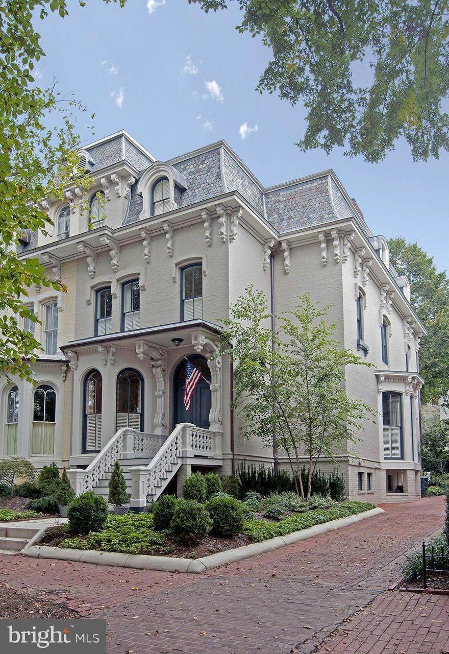 Spectacular 5 BR/ 5.5 BA townhouse with voluminous ceilings, gorgeous hardwood floors, a magnificent curved staircase and high-end finishes throughout. The gourmet kitchen has access to the large deck and backyard. Luxurious master suite includes a large bedroom, walk-in closet and stunning master bathroom.