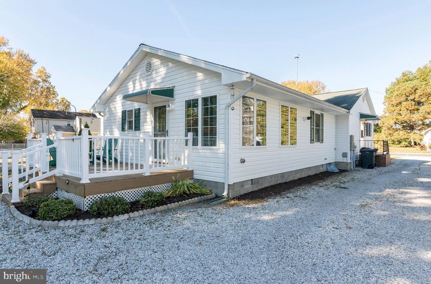 Improved Pricing!  
Welcome to Vienna.   The historic town of Vienna offers a unique blend of small-town charm with its farmers market, Millie's Roadhouse restaurant, a riverfront boardwalk, visitor center, festivals, and live music on the river.  First time on the market, this adorable and well maintained 3 bedroom 2 bathroom home sits one block off of the Nanticoke River.  With easy access to the public boat ramp you will enjoy enjoy boating, kayaking and fishing & crabbing This unique property houses a huge detached garage big enough for several cars and a boat as well as heated office  space and additional storage areas.  Behind the garage you will find another open garage space complete with a  walk-in  refrigerator.  With its proximity to Salisbury, Cambridge, and Ocean City, this Vienna home makes it ideal for new home buyers or investors.