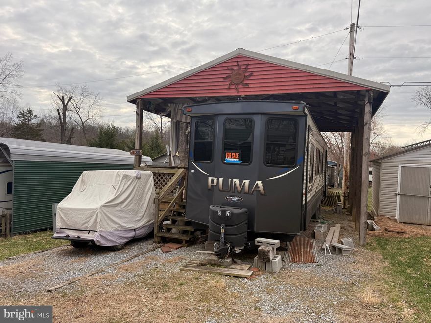 Approx. 10 miles of Deep water on the Potomac River access for boating, fishing & swimming. Annual membership $1,775 with  a $200 initiation fee for new owners.  Included with membership electric, water, sewer (or pump out), trash and Amenities : Boat Ramps (sep fee), 3 pools, kids play areas, putt putt golf, basketball/tennis courts, on site restaurant and store, annual events such as trick or treat, fireworks, live music and more.