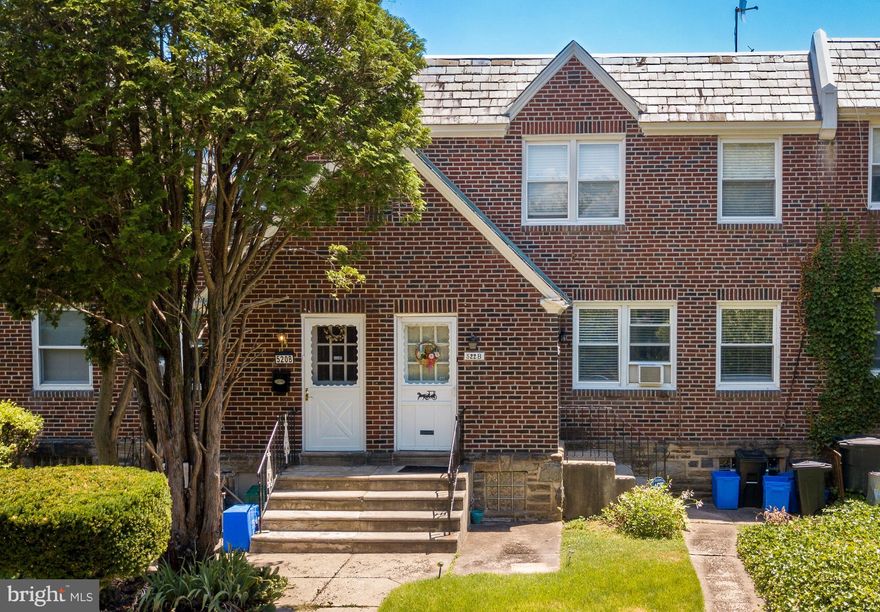 Solid brick duplex (2-unit) row on a beautiful block in historic West Mt. Airy!  Live in one unit and rent out the other. Blocks from public transit and Carpenter’s woods and Wissahickon Valley Park. First Floor unit is open with two bedrooms and handsome refinished hardwood floors. Kitchen has new dishwasher, sink/garbage disposal, new stove and new fridge.  New tile and cabinets have been refinished. New lighting throughout.  Second Floor offers another 2 bedroom unit.  Tenant moves early August. 2 new top notch furnaces (crown boilers) -- one for each unit in 2020. New silver coating of roof in 2024. Each unit has it's own washer / dryer -- 3 of 4 new in last few years. 2 Car attached garage and lots of basement storage with separate storage for each tenant. Separate meters for each unit.  Short drive or bus/train ride into the city and minutes away from shops and restaurants of Mt. Airy and Chestnut Hill and close by suburbs.