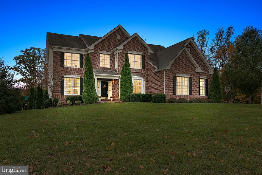 WOW! BEAUTIFUL TOLL BROS HOME W/3 CAR GARAGE ON A FLAT, FENCED .7 ACRE LOT, BACKS TO TREES & PERFECT FOR A POOL! OPEN FLOOR PLAN -GOURMET KITCHEN W/GRANITE OPENS TO DRAMATIC 2 STORY FAMILY ROOM W/ A FP & WALL OF WINDOWS! MSTR SUITE W/ SITTING RM, RENOVATED SPA BATH, HUGE WI CLOSET W/BUILT-INS. FULLY FIN WALK OUT LL W/FABULOUS BAR & THEATER ROOM! TREX DECK, PAVER PATIO. WARRANTY