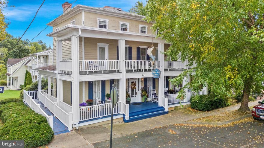 PRICE ADJUSTMENT!! 
Step Back in Time at the Blue Max Inn
Welcome to the Blue Max Inn, a charming and historic Bed & Breakfast nestled in the heart of Chesapeake City, Maryland. This beautiful Victorian Inn offers a unique blend of old-world elegance and modern comforts, making it a beloved retreat in Chesapeake City which is along the Chesapeake and Delaware Canal.
Operating under the same ownership for over 20 years, the Blue Max Inn is a rare opportunity to own a piece of local history. The main inn features nine bedrooms and ten bathrooms spread across three floors, with a bathroom and office located in the walk-out basement. The main floor boasts a fully equipped kitchen, formal dining room, breakfast room, main parlor, and two luxurious suites—The Lindsey Suite and Honeymoon Suite. At the front of the inn, a grand porch invites guests to relax and soak in the sights and sounds of this picturesque waterfront town.
Guests and residents alike enjoy Chesapeake City’s quaint shops, fine dining, and rich historical charm.
Included with the property is a separate Carriage House, located just down the street on 3rd Street, yet still part of the same parcel. Currently serving as the owner’s residence, the Carriage House features a spacious living room with a gas fireplace and cathedral ceiling, a full kitchen, a large bedroom with a walk-in closet, and a luxurious bathroom complete with a jetted tub and walk-in shower. Additionally, it includes a three-car garage and a private parking lot behind the building. Adding additional parking to the Inn.
The property is zoned Village Center, offering flexibility for various uses—from continuing its operation as an inn to converting it back into a single-family home. For specific zoning information and possibilities, please contact the Town of Chesapeake City.
Whether you're looking to run a successful inn, launch a new business, or create a stunning private residence, the Blue Max Inn offers endless potential. Come see all that this remarkable location has to offer—and make it your own!