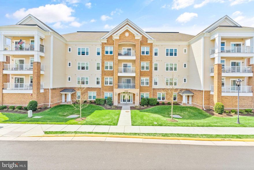Nestled in the Highly Desired 55+ Community of Potomac Greens.  Walking Distance to One Loudoun Town Center and some of the finest shops and restaurants in Loudoun County.  This top floor corner unit is one of the largest units in the building.  A two bedroom with a separate den allows for two potential bedrooms or an extra office/study space.  The owner's suite includes a walk-in closet with closet organizer's, a spa like bathroom, and plenty of space for rest and relaxation.  Enjoy evenings with friends and family in the living/dining area.  Features include pristine hardwood floors, tons of natural light, a cozy gas fireplace, and space to have family meals in the dining room area.  Any chef would enjoy cooking in the spacious kitchen that offers plenty of cabinet and counter space, granite counter tops, backsplash, and stainless-steel appliances.  The private balcony allows for comfort of the outdoors and a place where you can enjoy the element of nature.  Don't miss this incredible opportunity!!!