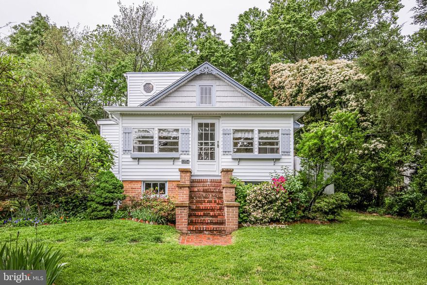 ***This charming home will win your heart as soon as you drive up the driveway onto the property! The yard, with over 1/3 acres, is full of blooming flowers and will be a dream come true for any gardener. Even if you don't have a green thumb, the outdoor space is the perfect spot for al fresco dining or just listening to the sounds of the birds chirping. Step inside and you will definitely fall in love! Original hardwood floors, original doors and hardware, original claw foot tub, and a wood burning stove add to the uniqueness of this home.  You'll appreciate the care that has gone into this home, with new siding (2020), new roof and gutters (2020), new chimney cap (2020), a renovated upper level bathroom (2020), as well as all new carpeting in the upper level bedroom (2021).  Two of the three bedrooms are found on the main level, with a shared hallway bath. The upper level houses the owner's suite, with it's own private bathroom. The kitchen has also been updated, with modern cabinets and granite countertops. Invite friends and family over and enjoy time hanging out in the kitchen and family room area while catching up. The basement adds some extra storage and workroom space, and could easily be updated to add additional bedrooms. Short trip into Old Town Occoquan is a plus, where you will enjoy fantastic restaurants, shops, and the waterfront. Don't miss out! This home is a winner!