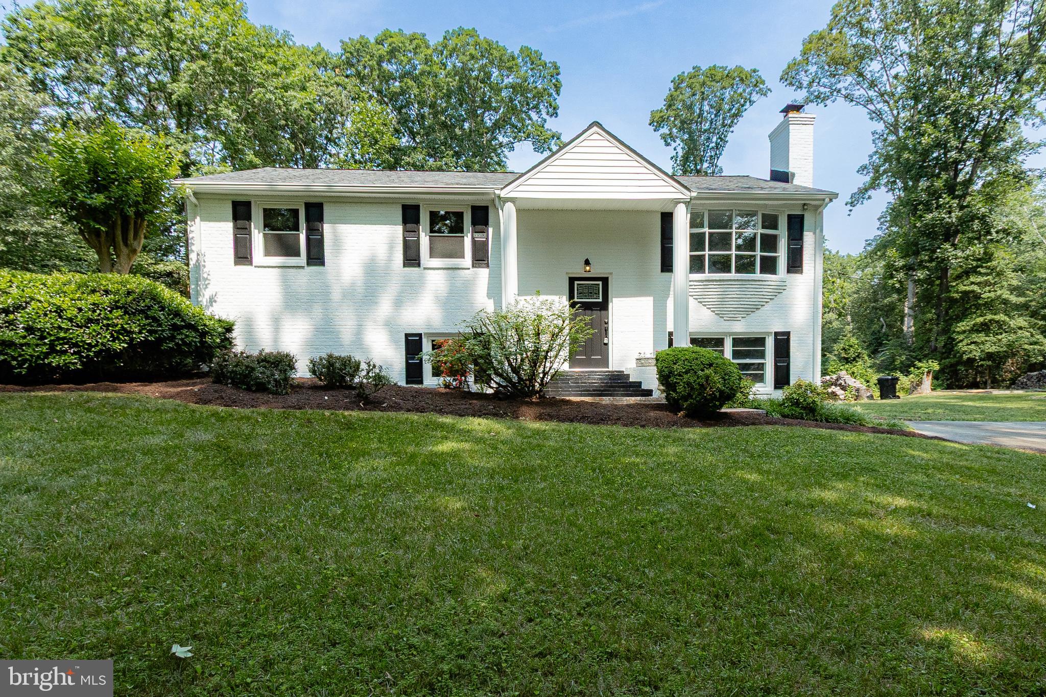 Beautifully updated 4 bedroom 2 bath home with all season room that has beautifully view and wonderful hardscape and fish pond. Large kitchen with room for a large table to sit a large group of friends to entertain.
The landscape is so well done. Private setting with sun room and huge deck. Basement has a cozy fireplace and walk out. 3 bedrooms upstairs and one downstairs. This lot is magical.