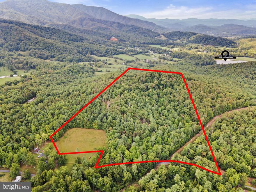 This gorgeous 25.52-acre property is READ TO BUILD your dream mountain retreat at the top of the plateau. // Mountain top parcel with SHENANDOAH VALLEY VIEWS features CLEARED AREA (3-4 acres) at bottom of property as well as heavily wooded acreage.  //  ACCESS THE PROPERTY from a private gravel driveway easily accessed from DRY RUN ROAD which is a State maintained, paved road. Private driveway continues to top of parcel.  RECOMMEND 4-WHEEL DRIVE for driveway to top of parcel. // Just minutes away from downtown Luray, the Shenandoah National Park and Skyline Drive with shopping shopping and dining nearby. // Enjoy nearby (2 miles) Lake Arrowhead Park which features a beach, swimming area, picnic shelters (available to rent), fishing and boating (with permit). 
 //  SEPTIC DESIGN IS COMPLETE - Three (3) Bedroom Perc. Documents are provided. // Private Driveway is gated & locked. Appointment only.