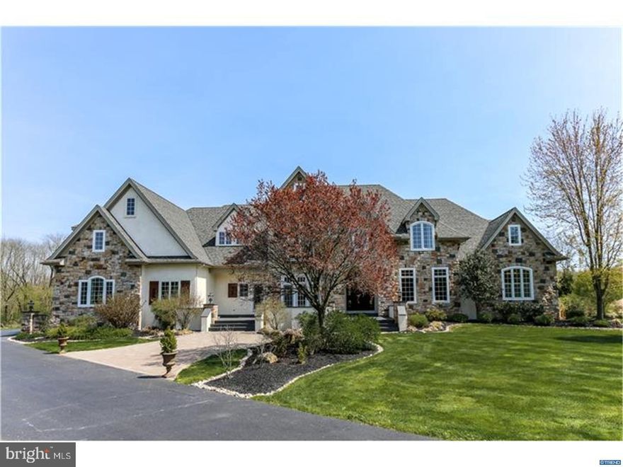 Three levels of luxury living built with unrivaled craftsmanship make up this custom 11,500+ square foot home on a 4 acre estate situated at the end of a private lane with secure access code driveway gate and in the Unionville Chadds Ford School District!  Originally constructed by Builder for his personal residence, this home has been meticulously maintained by the current owner including over $150,000 of improvements that further enhance this dream home. Exquisite finishes include Peruvian Limestone heated floors, on site finished mahogany wood floors, custom millwork, trim detail, wainscoting, coffered & tray ceilings and 150+ recessed lights. The backyard oasis is complete with built-in Coyote grill, refrigerator and firepit surrounding the pool with waterfall and plenty of room for sunbathing. Stairs lead from the pool to the "pool-house" in the finished basement with a well-appointed and fully equipped Kitchen, his & her changing rooms, full bathroom, and much more. Seating for 8 and room for more in the multi-level home theater. The main level Master Retreat has built-in cabinetry, gas fireplace, his & her walk-in closets and a luxurious 6-piece Master Bathroom with radiant heated tile floors. Not to be missed is the fully stocked "Man Cave" for your entertaining pleasure with direct access to the pool area. The gourmet Kitchen is a chef's delight with a Dacor 6 burner commercial range with dual ovens, two dishwashers, two sinks, built in refrigerator, Miele plumbed coffee maker and Meile micro/conv oven. Custom cabinetry with exquisite upgrades, enhanced crown moldings and under cabinet lighting. The center island with farmhouse sink, dishwasher and bar height seating for four. Completing the first floor is a formal step-down Dining Room with French doors leading to the front patio, a formal Living Room with wet bar and wine cooler, a private Study with an abundance of cabinetry, desk for two and gas fireplace. Spacious Laundry Room, 2 Powder Rooms, the Sunroom with see-through gas fireplace and access to the pool area. Expansive 2-story Family Room with wood burning stone fireplace and French doors to a private deck. The second-floor boasts 2 Junior Suites with Sitting Rooms and private Baths, two additional Bedrooms with en-suite Baths, a large Recreational Room and back staircase. Indoor/outdoor home audio system. 4   car garage, PUBLIC WATER & SEWER. Less than 2 miles from Unionville High/Patton Middle Schools.  Luxury living at its finest!