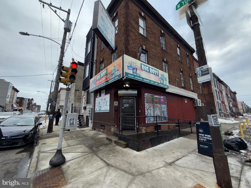 Investor Alert!! Great 3 Story Mixed Use Corner Property with store on the 1st floor. 2nd and 3rd floors have 6 bedrooms with multiple bathrooms and showers. Could easily be split into multiple apartments.  Building currently leased. through 2027.  Being sold in as-is condition.