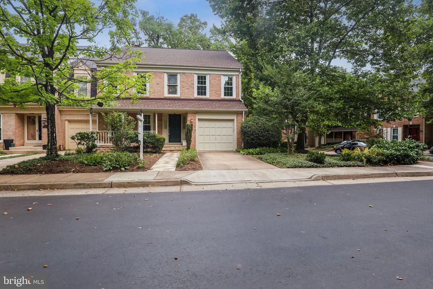 Step into luxury at 1569 McLean Commons Court, where convenience meets charm in this rare end-unit garage townhome. Boasting 4 bedrooms and 3.5 bathrooms, this delightful home spans a generous 3990 square feet lot. Upon entry, a two-story foyer with skylight welcomes you, leading to the warmth of hardwood floors and cathedral ceilings that create an inviting, spacious ambiance. The updated kitchen is a chef's dream, featuring an island, access to the large deck through french doors, and an open layout to the 2-story family room, complete with a fireplace. A separate dining room and large living room complete the main level, offering ample space for entertaining. Upstairs, the primary suite exudes elegance with a cathedral ceiling, en suite bath, and generous closet space. Additionally, two bedrooms, a full bath, and a loft with built-ins overlooking the family room await. The lower level boasts a large storage/utility/laundry room, a cozy rec room with a fireplace, and french doors leading to a brick paver patio in the private fenced backyard. The fourth bedroom and another full bath are also located on this level, offering flexibility and privacy. Outside, a deck and brick paver patio provide the perfect spots for outdoor relaxation amidst the lush landscaping that surrounds this private enclave.  Conveniently located in McLean, this home offers easy access to a variety of amenities and attractions, making it an ideal retreat from the city's hustle and bustle. With its commuter-friendly location, this modern townhome is a commuter's dream, providing the perfect balance of luxury, convenience, and accessibility.