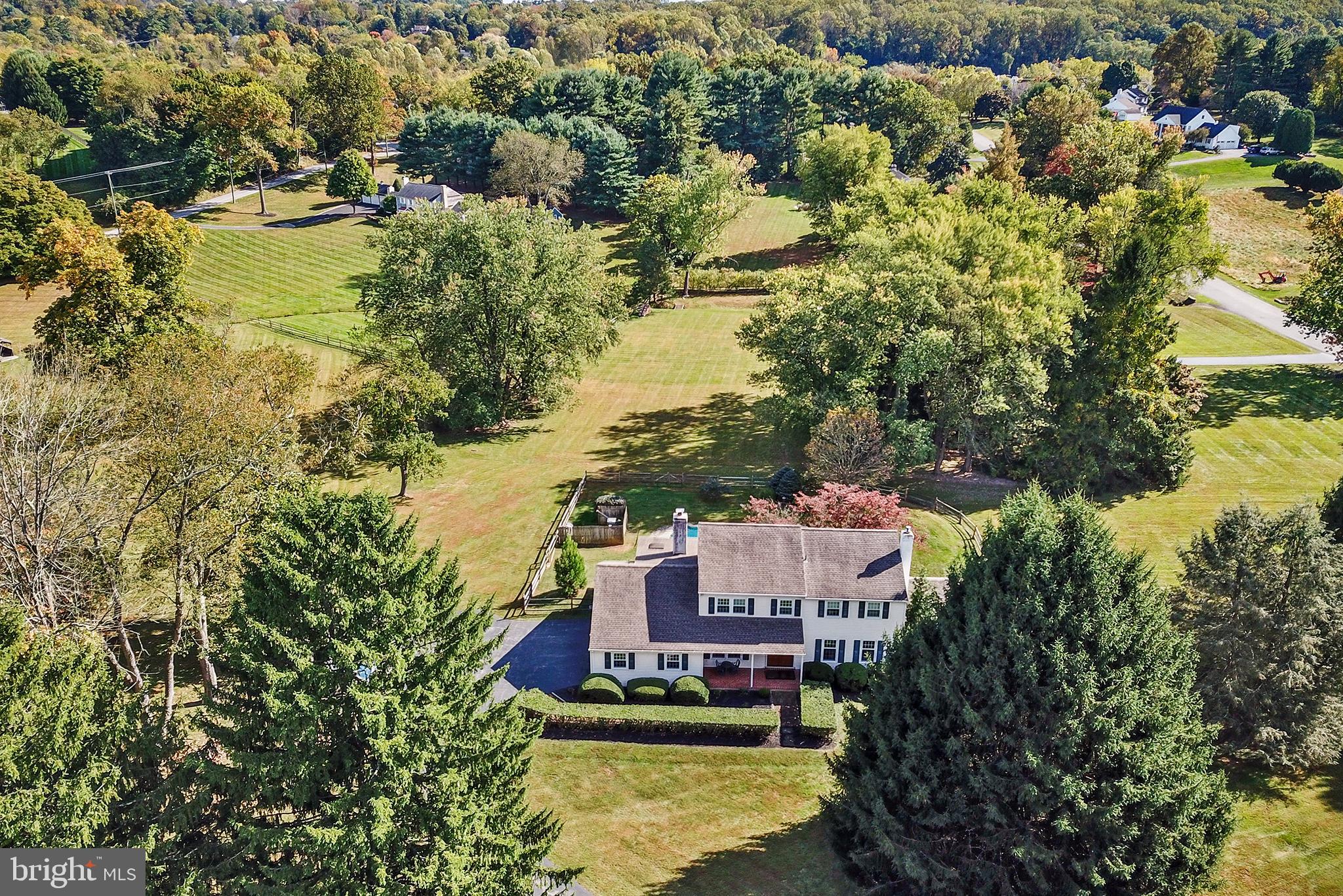 Elegant Colonial Retreat in Thornbury Township – West Chester Area School District
Nestled in a quiet, sought-after residential neighborhood in Thornbury Township, this beautifully maintained Colonial home offers the perfect blend of timeless charm and modern comfort. Situated on nearly two private acres, this 4-bedroom, 2.5-bathroom home provides an exceptional lifestyle in the award-winning West Chester Area School District.
Step inside to discover a warm and welcoming layout featuring a large sunny living room, a spacious great room with a cozy fireplace, wood beamed ceiling and direct access to a screened-in porch, perfect for relaxing or entertaining year-round. The sun-drenched solarium brings the outdoors in, offering a peaceful space to unwind with your morning coffee or evening book.
The heart of the home includes a dedicated home office, ideal for remote work or study, a first-floor laundry room for convenience, and a large eat-in kitchen ready for your personal touch. Access to the garage and mud room driveway entrance can also be found here.
Upstairs, you’ll find four generously sized bedrooms, including a serene primary suite with an en-suite bath and a sunny hall bathroom shared by the additional bedrooms.
Outside, the expansive yard is a private oasis featuring an in-ground pool with spa and cascading waterfall, mature landscaping, and plenty of space for recreation or gardening—all tucked away in a tranquil setting with plenty of room to roam.
This rare find combines space, privacy, and location—just minutes from downtown West Chester, local parks, and major commuting routes.