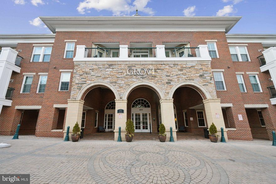 Welcome to The Grove at Arlington, where modern living, resort-style amenities, and unbeatable convenience converge in one of Northern Virginia’s most sought-after addresses. Perfectly situated in the heart of Arlington, this exceptional condominium offers effortless access to the energy of city life, a quick commute to Washington, D.C., and an array of premier amenities right at your fingertips—all within the building itself.

HVAC (2023); Dishwasher (2025); Washing Machine (2024); Windows & Doors to Balcony (2019); Carpet (2025)

From the moment you arrive, The Grove impresses with its beautifully landscaped grounds and luxury amenities. Residents enjoy exclusive access to a shimmering outdoor pool with lap lanes, a fully equipped fitness center, a media/movie room, a stylish resident lounge and party room, a business center, a library, a billiards room, and a community grill and picnic area. Even errands are effortless thanks to a dedicated package/mail room—perfect for your Amazon returns—and professional on-site management. A private, covered garage includes a dedicated parking space for the unit, with a shuttle stop just outside the garage that provides direct access to the Pentagon Metro, only 1.4 miles away.

Take the elevator up to the second floor, where your serene urban retreat awaits. This thoughtfully designed one-bedroom, one-bath condo is a perfect blend of modern style and everyday comfort, boasting high ceilings and an open-concept layout that creates an airy, inviting ambiance. As you step inside, rich hardwood flooring flows throughout the main living areas, complemented by fresh paint and contemporary finishes that elevate every corner of the space.

The living and dining area seamlessly connects to a private balcony that overlooks the community’s peaceful garden and pool—a tranquil escape ideal for morning coffee or evening relaxation. A large utility closet on the balcony provides additional storage for your convenience.

The stylish kitchen comes equipped with granite countertops, stainless steel appliances, gas cooking, and abundant cabinetry. Whether you're preparing a gourmet meal or hosting guests, the kitchen offers both style and function in equal measure.

The primary bedroom is spacious and sunlit, offering direct access to the full bathroom and a generous walk-in closet outfitted with custom closet organizers.

The bathroom features elegant tile flooring and a versatile shower/tub combination, ideal for both unwinding and efficiency. A laundry closet with a full-size washer and dryer completes this perfect package, offering modern-day convenience without compromise.

Located just minutes from the Pentagon, Amazon HQ2, Reagan National Airport, Shirlington, Del Ray, and Old Town Alexandria, this residence is a commuter's dream and an urban explorer’s paradise.

At The Grove at Arlington, you’re not just purchasing a home—you’re investing in a lifestyle.