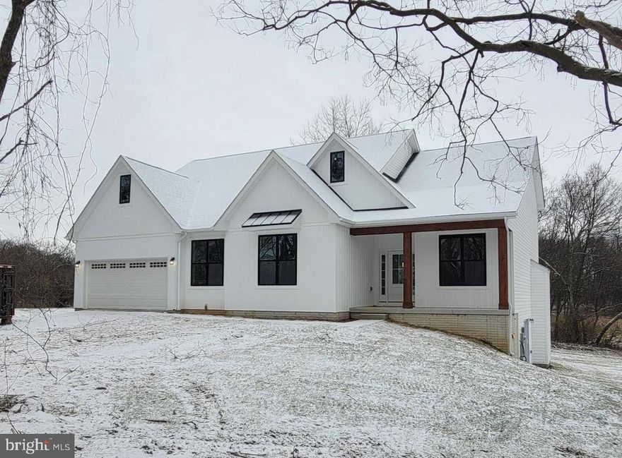 Over 5 acres  situated just off the VA line. Amazing location for this 4 bed 2.5 bath farmhouse style home. Quality construction nicely upgraded with stainless steel kitchen appliance package, granite, luxury vinyl plank flooring, upgraded cabinets, vaulted ceilings & more. Full unfinished basement. Close to amenities in a private country setting. Builder has tastefully selected most of the finishes for you. Front Load garage as shown with upgrades. Pictures are of similar finishes and layout.  Completion expected for Feb/March 2024.  Just minutes away from all the amenities of Charles Town and Winchester. Great commuter location for Norther Virginia area.