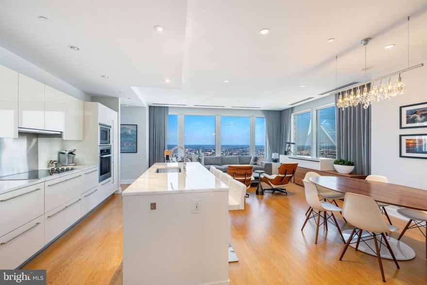 Welcome to the pinnacle of Philadelphia luxury at The Residences at Two Liberty Place. Unit 5205 is an exquisite, move-in-ready sanctuary situated on a high floor, offering breathtaking panoramic skyline views that stretch across the city all the way to the Ben Franklin Bridge and New Jersey through signature wall-to-wall windows. This meticulously designed residence features three spacious bedrooms, each boasting a private en suite marble bathroom and large custom closets along with an additional chic powder room for guests. The chef’s kitchen is a masterpiece of modern design, featuring sleek Snaidero cabinetry, expansive marble countertops, and a professional-grade appliance suite including a Sub-Zero refrigerator, Miele wall oven and cooktop, and a Sharp convection microwave. Rich hardwood flooring and recessed lighting flow throughout the open-concept living spaces, creating an atmosphere that is as inviting as it is sophisticated.  

Life at Two Liberty Place offers an unparalleled five-star lifestyle centered around the 37th-floor Sky Club. Residents enjoy exclusive access to a world-class fitness center, yoga studio, sauna, steam rooms, and the iconic indoor "endless" pool. Social amenities include a sophisticated resident lounge with a billiards parlor, a private board room, and a media room. The building’s white-glove service is second to none, providing a 24-hour doorman, concierge, and a chauffeur-driven  town car for local travel.  Your very own storage locker located on the 40th floor.  Perfectly positioned in the heart of Center City at 16th and Chestnut, you are steps away from Philadelphia’s premier fine dining, luxury shopping at the Shops at Liberty Place and Rittenhouse Row, and the city’s vibrant entertainment and cultural hubs. With immediate proximity to Suburban Station and major public transportation, the entire region is at your fingertips. As an added incentive, the seller is offering a one-year pre-paid parking credit with an acceptable offer. Experience the height of urban elegance in one of the city’s most iconic landmarks.
