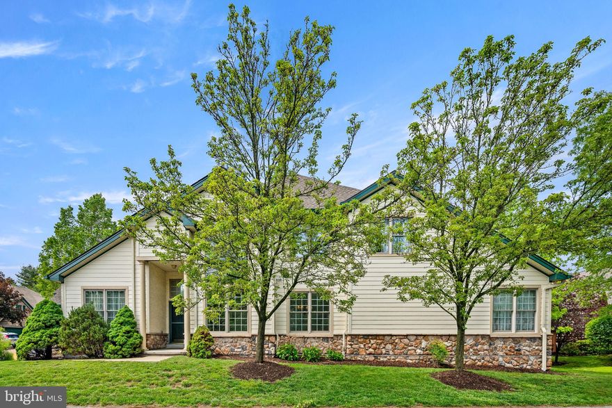 Welcome to refined living in this beautifully appointed 3,100 sq. ft. end-unit townhouse, ideally located in an upscale, guard-gated, active adult community at Hershey’s Mill, which is known for its elegance, security, and vibrant lifestyle. This spacious residence offers soaring ceilings, expansive rooms, and abundant natural light that creates a bright, airy ambiance throughout.  Designed for comfort and entertaining, the house features an open-concept layout highlighting generous living and dining areas, seamlessly connecting to a modern kitchen with s/s appliances, including a Miele dishwasher, and casual living space in the family room that opens to a deck through a sliding door.  The  mudroom on the main level features state of the art washer and dryer with a second refrigerator.  The primary bedroom on the main level boasts a true walk-in closet and a huge spa-like bathroom with double sinks, plus a convenient linen closet.  If you need an office, you have the choice of a room on the main level or the upper level (and either one can be a bedroom), or you can choose the study area or the loft area of the upper level.  Additional square footage is in the full finished basement, perfect for a media room, fitness area, guest suite or anything that you desire.  As you can tell, the versatility of this property lends itself to meeting the style of you, your family and your guests.  Enjoy the convenience of an oversized 2-car attached garage, ample storage throughout the house, and a layout that blends function with luxury.  Exterior is partial stone, with most of the rest Hardie plank siding.  New roof (2024), new water heater (2025), new garbage disposal (2025).  Set in a prestigious neighborhood, this house offers peace, privacy, and easy access to the exceptional amenities that define the community’s lifestyle.  Residents have access to a beautifully appointed clubhouse with social and activity rooms, including a library and a calendar full of community events and clubs, such as art, yoga, bridge and many others. Golf enthusiasts will appreciate the on-site golf course, while others can enjoy the scenic walking trails and manicured grounds.  Other facilities are a heated outdoor swimming pool for relaxing or staying fit, tennis and pickleball courts for friendly competition, and a dog exercise area.  This exceptional property is ideal for those seeking an upscale, low-maintenance lifestyle with access to world-class amenities and a welcoming community of like-minded neighbors.  Call for a private showing today.