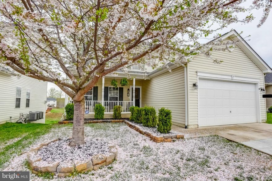 LOOKIN' GOOD IN THE NEIGHBORHOOD! Set in an ultra-convenient location, close to a full range of local amenities, VRE & 95. Upon entering this home, immediate attention is drawn to the warm and relaxed feel.The home features new carpet, new appliances, newly renovated full hall bath! Downstairs finds the framed basement ready for your finishes to create a comfortable entertaining space/movie room!