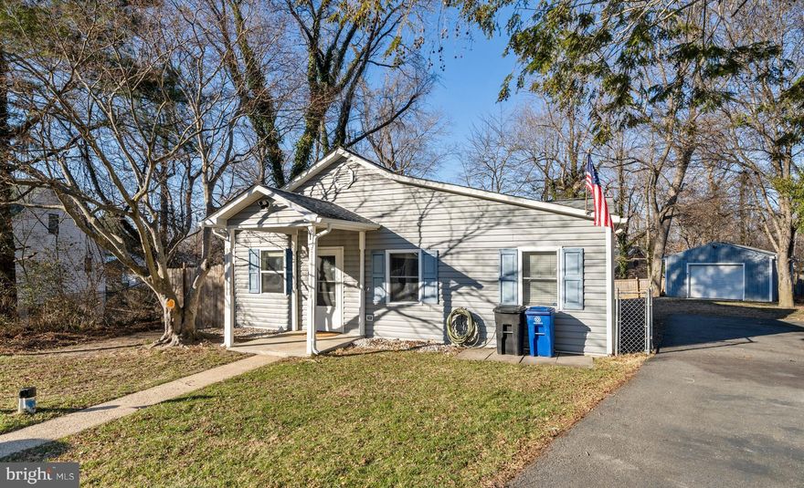 WELCOME HOME to this charming, 1-level living home with open floor plan! Perfect for first-time buyers seeking a move-in-ready space or those looking to downsize for the ease of single-level living! Enter the front door to tasteful vinyl wood flooring and fresh paint throughout! The open layout seamlessly flows into the family room featuring a stone, wood-burning insert… providing plenty of heat and comfort throughout the house during the colder season! Kitchen off the family room boasts granite counters, stainless steel appliances, a cozy breakfast nook/table space. The primary bedroom tucked off the kitchen has a ceiling fan, attached bathroom with a large soaking tub with jets, and a walk-in shower. Bedrooms two and three share a convenient Jack-and-Jill bathroom. Outside, the fully fenced-in backyard includes a large deck, a detached garage, and a breezeway leading to a workshop space with utilities. You won’t want to miss out on this wonderful home! Schedule your showing today!