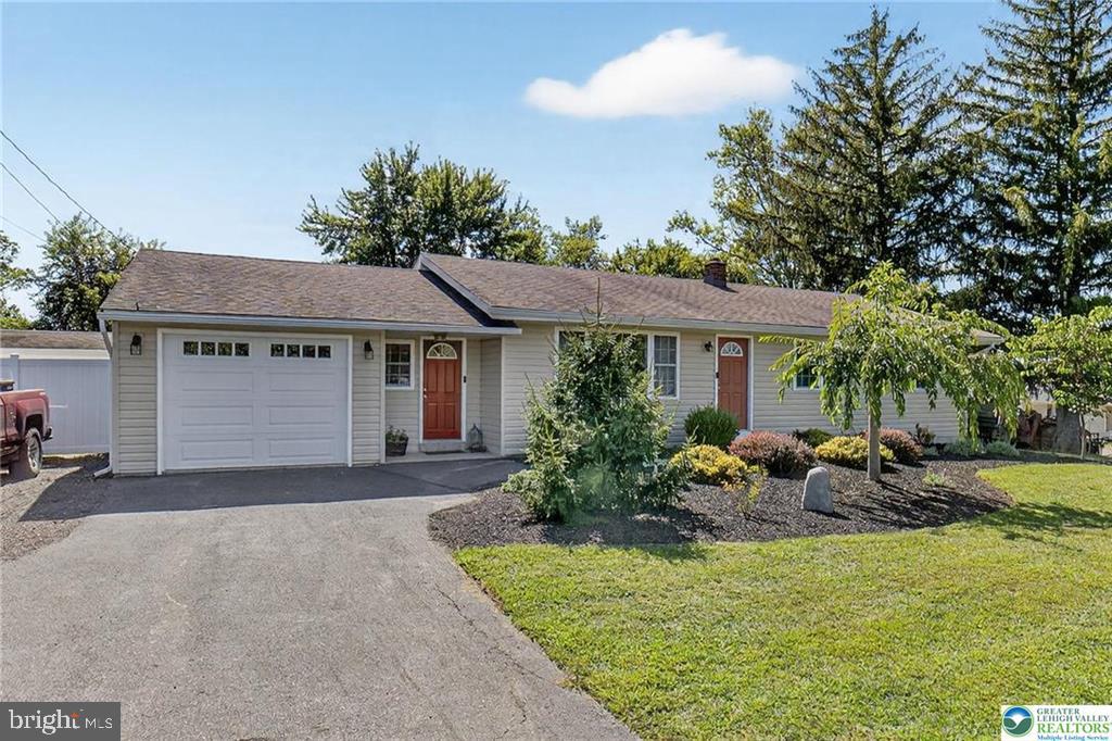 Welcome to this beautifully updated ranch rental in Quakertown, offering 3 well-appointed bedrooms and 2 full bathrooms on the main floor. The home sits on over 1/2 an acre of flat, usable land with a poured concrete patio (partially covered for rainy-day grilling), firepit area, and plenty of outdoor space for entertaining. Inside, you’ll find a spacious open-concept main floor featuring a remodeled kitchen with stool seating, adjoining dining area, and a large living room with plenty of natural light. The bright sunroom, equipped with its own mini-split system, overlooks the backyard for year-round enjoyment. A huge family/rec room in the basement adds versatile living space. Additional features include an oversized 1-car garage plus driveway parking for up to 7 vehicles, central air, oil baseboard heat, washer/dryer, and thoughtful updates throughout. Routes 309, 313, 663, and PA Turnpike/I-476 nearby for easy commuting to Allentown, Bethlehem, Doylestown, and Philadelphia. Close to Quakertown’s shops, dining, and breweries, as well as conveniences like grocery, banks, and fitness centers. Minutes to Lake Nockamixon State Park for boating, fishing, trails, and outdoor recreation and convenient to Quakertown Farmers Market, Univest Performance Center, and area schools!