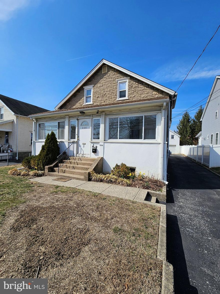 Spacious 1st floor unit in a duplex.  Enter into a large enclosed porch then into a nice size living room & dining room with wood flooring, 3 bedrooms with wall to wall carpeting along with an updated hall bath.  The newer Kitchen has cherry cabinetry along with granite countertops.  There is a mud room which leads out to a nice back yard with 1 car off street parking.  Laundry area is in the lower level.  Walk to everything location, Carlinos, Septa high speed line, the regional rail plus parks  & restaurants.  Lower Merion Schools!  NO PETS