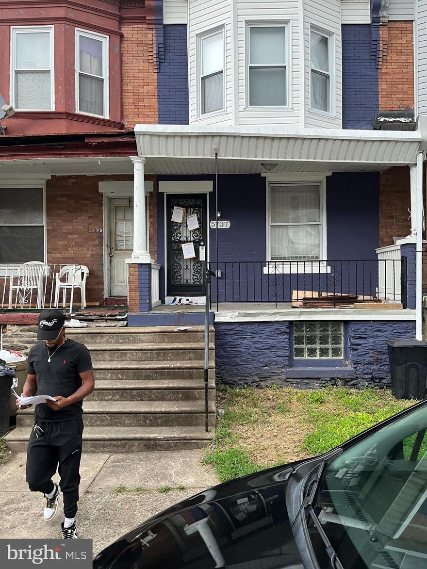 This building is full of shared living spaces complete with laminate floors and a newly renovated kitchen full of cabinet and storage space. There are three bedrooms and three private bathrooms in this building, with the first bedroom and bathroom located on the first floor. There are also two bedrooms and private bathrooms located on the second floor, also with good-sized closets for extra storage needs. The basement located downstairs also has ample room for storage and organization. This house could be used as a co-living investment property or easily converted to a single-family residence.