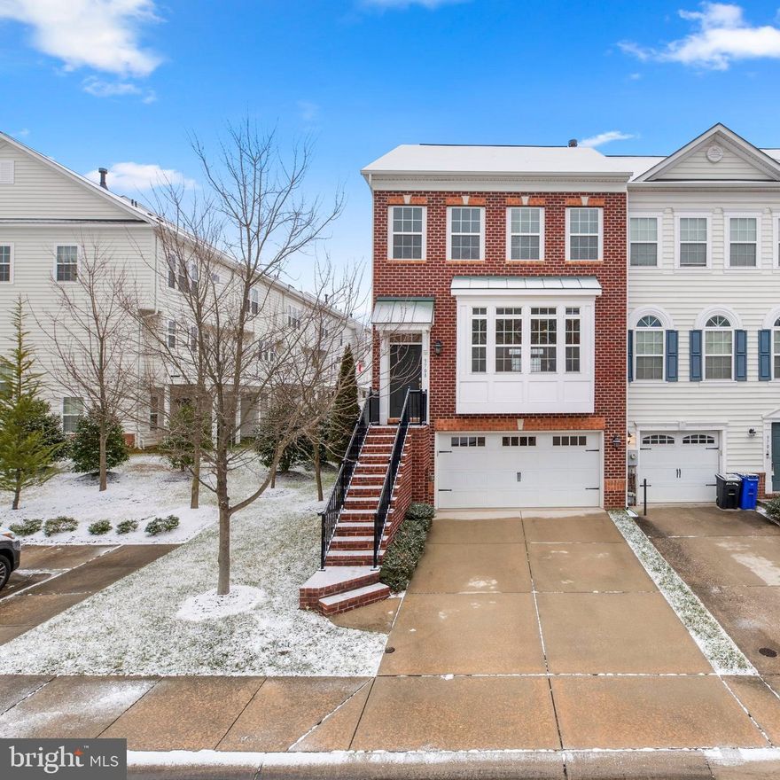 End of Group 3 bedroom, 2 full bath, and 1 half bath 2 car garage townhome in sought after Emerson Community.The open floor plan features a living room and dining room separated by a three sided gas fireplace. Spacious  eat-in kitchen that features stainless-steel appliances, gas oven, granite countertops, large center island, 42 inch cabinetry, built-in microwave and hardwood floors.Natural lighting creates the perfect ambiance in the generous primary bedroom that benefits from an en-suite bathroom and features a large walk-in closet, plus a seperate additonal closet.The primary bathroom boasts a walk-in shower, double sinks, and ceramic-tiled flooring. Two additional bedrooms an additional full bath and laundry complete the top level.The lower level features a slider to the rear yard as well as a rough in for full bath and garage access. Enjoy the view overlooking community open space from  the large composite deck off of the kitchen. An amazing location minutes to major routes 95,32 & 29, BWI, Baltimore, DC, Ft. Meade and NSA.