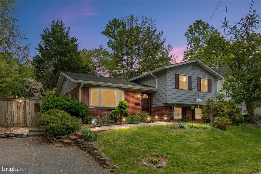 OPEN HOUSE SAT 4/25 12-2PM & SUN 4/26 2-4PM Fantastic location across from Dogwood Park, which has a creek, playground, and tennis/pickleball courts. Situated on a quiet, tree-lined street near Stoneridge Pond. Convenient to Rockville Town Square, I-270, I-495, Rockville Pike, and a wide range of shopping and dining options. Schools are located within approximately 1 mile, with additional neighborhood amenities nearby.

Well-maintained split-level home offering 5 bedrooms and 3 full baths, plus a lower-level family room and spacious laundry/storage area. Bright interior with large windows and abundant natural light throughout the living and dining areas. Eat-in kitchen with park views and sunset exposure, featuring high-end Leicht cabinetry and Miele & KitchenAid appliances.

Recent updates include roof, gutters with guards, HVAC system, water heater, cantilever retaining wall, and encapsulated crawl space. Multiple outdoor living spaces include a wisteria-covered deck, paved terrace off the main living area, gravel patio, and raised garden area, with additional space for landscaping.

Terra-cotta tile flooring in the kitchen and lower level and wood flooring on the main and upper levels complete the home.