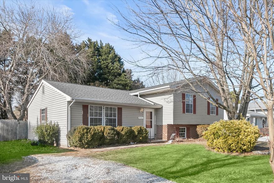 Beautifully updated, this stylish split-level residence blends thoughtful design with everyday comfort, offering a home that feels both welcoming and well cared for. Numerous upgrades can be found throughout, including updated light fixtures, crown molding, wainscoting, a newer roof, a fully renovated kitchen, and many additional enhancements that elevate the overall aesthetic.
The foyer makes a memorable first impression with custom wainscoting and a convenient drop zone designed for everyday essentials. Straight ahead, the spacious living room invites relaxation with built-in bookcases and cabinetry, while a sliding glass door replaced just two years ago opens directly to the backyard, creating an easy indoor-outdoor connection. The main level features a desirable circular layout that flows seamlessly into the heart of the home, a fully renovated kitchen showcasing stylish cabinetry, luxury vinyl plank flooring, a timeless subway tile backsplash, upgraded countertops, and stainless steel appliances, including a convection oven and a water filtration system. A generously sized dining area and pantry complete this inviting space.
Just a few steps up, the upper level begins with the primary bedroom accented by wainscoting, two closets including a walk-in with built-ins, and a private en-suite bath with updated flooring. Two additional bedrooms share a full hall bath, also refreshed with updated flooring. The lower level expands the living space with a comfortable family room, a bonus room ideal for a home office, and a large utility room with laundry, abundant storage, and a recently replaced washer.
Outside, the fully fenced backyard offers privacy fencing, a patio with gazebo for outdoor entertaining, and a storage shed. Additional updates include replaced ceiling fans and USB and USC outlets in the kitchen and living room. Ideally located on Camelia Drive in Easton, this home enjoys easy access to historic downtown, local parks, shopping, dining, and major routes, offering a perfect balance of small-town charm and everyday convenience.