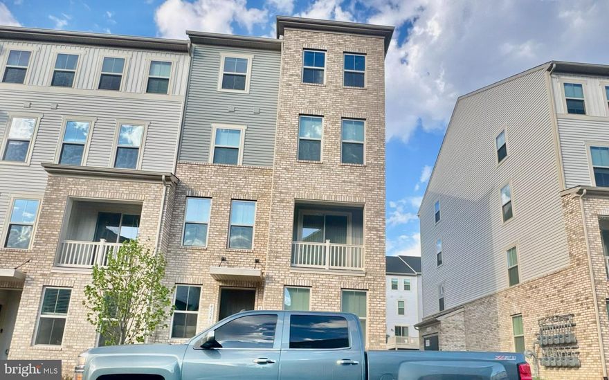 A beautifully finished 4-level corner-unit townhome by Ryan Homes (Romeo Model) in the highly desirable Arcola community in Loudoun County. Completed in December 2025, (early 2026), this home is part of the final and newest building in the neighborhood, offering modern finishes, abundant natural light, and a bright open layout.

The home features 3 spacious bedrooms and 2.5 bathrooms across four levels. As a corner unit, the
property benefits from additional windows, more natural light, and greater privacy compared to interior
units.

The main living level offers a large open-concept living and dining area with direct access to a private
outdoor deck, perfect for relaxing or entertaining. The property also includes a one-car garage with
driveway parking and additional storage space. A Tesla EV charger is already installed in the garage,
making it convenient for electric vehicle owners.

The home is within short distance of Elaine E. Thompson Elementary School. Located in the Arcola area of Loudoun County, the property offers quick access to the Silver Line Metro, major commuter routes, shopping, restaurants, and Washington Dulles International Airport.