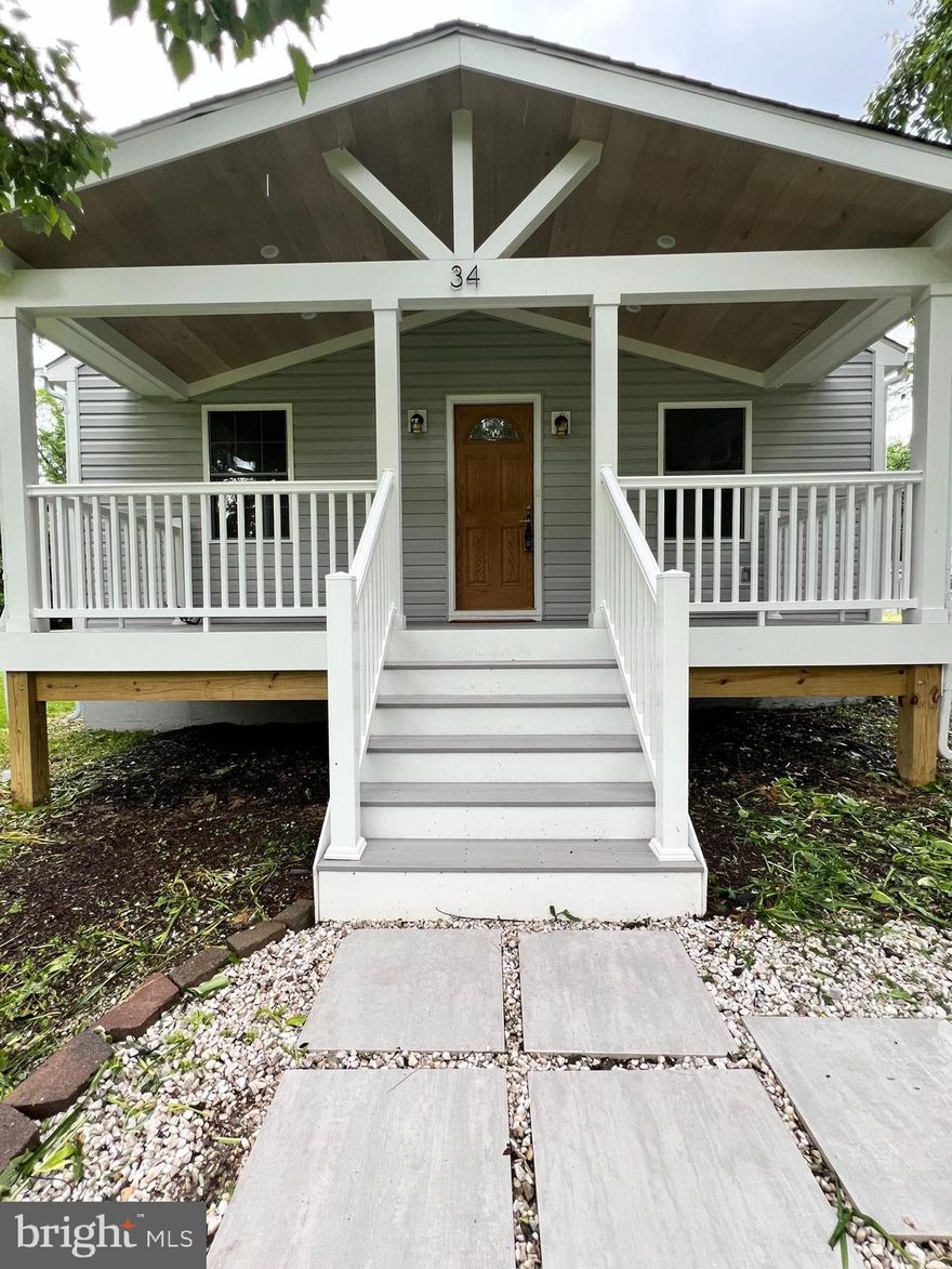 **COMPLETELY RENOVATED! EVERYTHING IS NEW! PRIVATE COUNTRY SETTING! **
This home is truly a rare find in this location and at this price! This one-level completely renovated residence features a spacious eat-in kitchen with elegant quartz countertops, a tankless water heater, and a large laundry room.
With two bedrooms, including a walk-in closet with custom-built-ins, and many upgrades throughout, you'll feel right at home. Enjoy relaxing on the enormous front porch with recessed lighting or entertaining on the large deck that overlooks your expansive yard.
Nestled at the end of a quiet road, this property offers exceptional privacy while being just 2 minutes from I-95 access and shopping. Don't miss your chance to experience unmatched value in a beautifully transformed home!