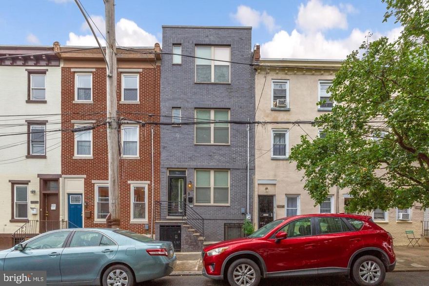 BEST VALUE in 19130 with 5 YEARS LEFT ON THE TAX ABATEMENT!  5 Years remaining on the Tax Abatement! This well-appointed 16-foot wide, 3-story home is nestled in one of the best pockets of the neighborhood where everything in this home is bigger, wider, taller, and brighter than other homes in this price range! It features 3 bedrooms, and 3 full bathrooms, with an oversized primary bedroom, ensuite 4-piece bath, large windows, finished basement, rear patio, and full roof deck! Other features include extra wide hardwood plank floors, recessed lighting, a private patio, a convenient 2nd floor laundry room, central air, and transitional finishes and fixtures throughout the entire home. Enter the FIRST FLOOR to this beautiful home with an open concept living/dining room leading to a large eat-in kitchen and patio, flooded with natural light. The Kitchen features stainless steel appliances with a vent hood (GE brand), gray 42” inch shaker style cabinets, white quartz counters, and large island with counter seating and additional storage. The L-shaped kitchen layout embraces the outdoor patio with large windows. The outdoor patio offers convenient access to outdoor space for lounging and grilling with added privacy from an adjacent open space. Proceeding to the SECOND FLOOR there are 2 generously sized bedrooms with ample closet space with a full bath a large vanity with marble counters, floor-to-ceiling tiles in the shower, and a laundry room with a stackable front-loading LG washer & dryer in between the bedrooms. The THIRD FLOOR is entirely dedicated to the homeowner, with a large bedroom with 9-foot ceilings that can accommodate a king-size bed and other large furniture. As you move to the rear of the floor there are TWO WALK-IN CLOSETS and an oversized Master Bath adorned with porcelain marble tiles, a walk-in shower with rain head, a double vanity with quartz counters, and a dual flush toilet. The large rooftop terrace is expansive with room for an outdoor living room with unobstructed views of the skyline. The BASEMENT is fully finished with a full bath and room for storage! Walk Score of 90, Transit Score of 79 & Bike Score of 83!! Quickly becoming the heart of the neighborhood. Close to the Philadelphia Museum of the Art and Eastern State Penitentiary, with plenty of shopping & entertainment options. Walkable to Lemon Hill, Fairmount Park, and Boathouse Row. Easily accessible via I-76, Kelly Drive, Route 13, and public transportation bus routes to get around the city. Local favorite spots include Brown Street Coffee, Hilltown Tavern, Figs, The Monkey & The Elephant, Zorba’s Tavern, and plenty more! Excellent value in an emerging area! 5 Years left on the Tax Abatement! Lease ends May 4th.