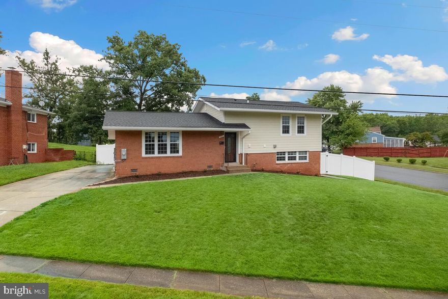 Welcome to this newly updated six-bedroom, three-full bathroom Split level home located in the beautiful Seabrooks Acres in Lanham, Maryland. The entry opens up to the cozy living room with brand-new flooring and a main-level bedroom. The kitchen boasts amazing new features including wooden cabinets, an island with a marble countertop, up-to-date appliances, and more. On the upper level find the primary bedroom with an en-suite full bath. and two other spacious bedrooms with a hallway bathroom. The lower level features a utility room, two additional bedrooms, and a full bath. Lastly, worth noting is the fenced-in backyard and patio perfect for gatherings all throughout the year. This home is conveniently located just off Annapolis Road and only minutes from the Enterprise shopping center with Aldi, GNC, and many more. Don't miss the opportunity to own this home!